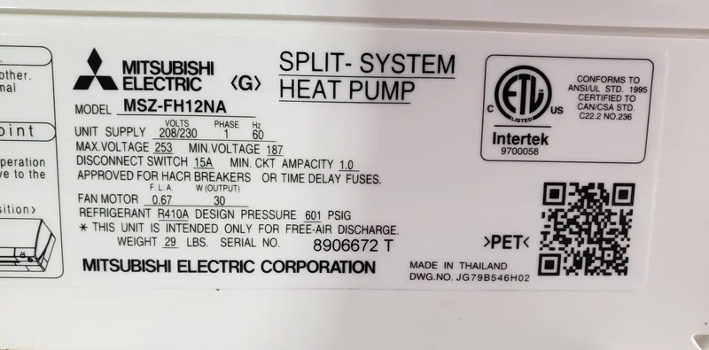 The model-number label on a Mitsubishi Electric indoor unit, reading MSZ-FH12NA, a wall-mounted single-zone heat pump