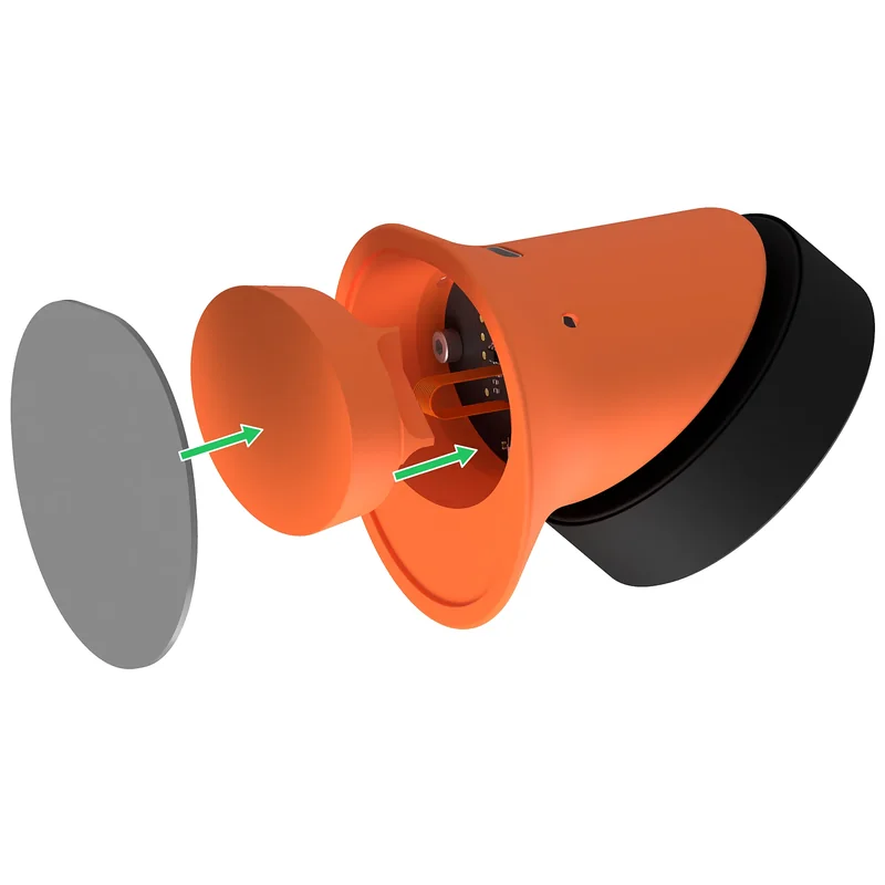 Exploded underside view with arrows showing the bottom cap entering the stand and the silicone pad attaching to the cap