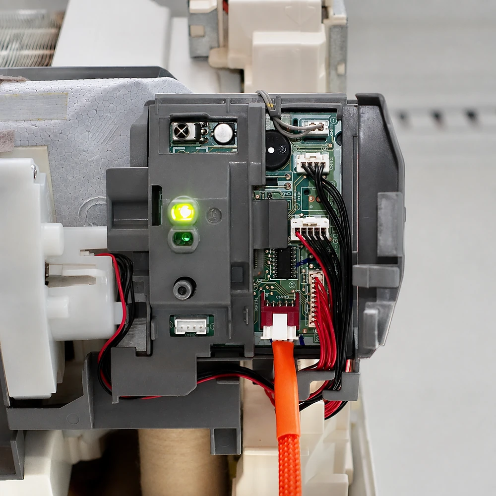 A CN105 cable connected to the control board inside a Mitsubishi MSZ-GL06NA indoor unit