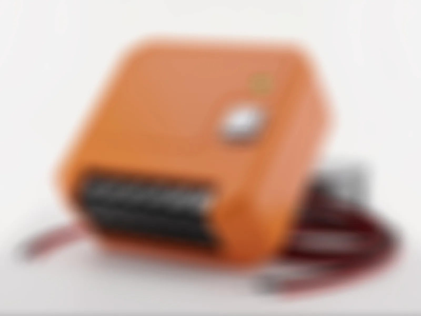 The Multi-Zone Pro controller in an orange enclosure with its wiring harness