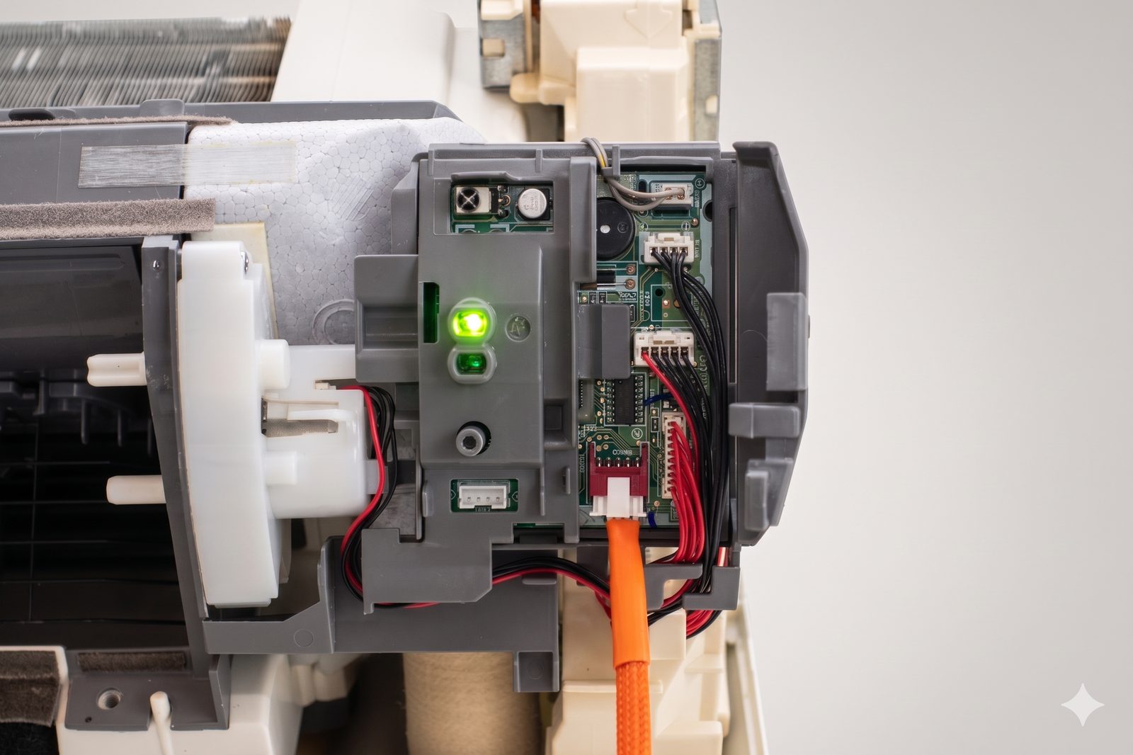 The red CN105 port on a Mitsubishi MSZ-GL06NA control board with the Serin CN105-to-Grove cable plugged in